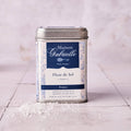 Maison Gabrielle Fleur de Sel salt canister on a light surface with a light background